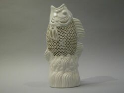 Asian-style Reticulated White Porcelain Fish. 